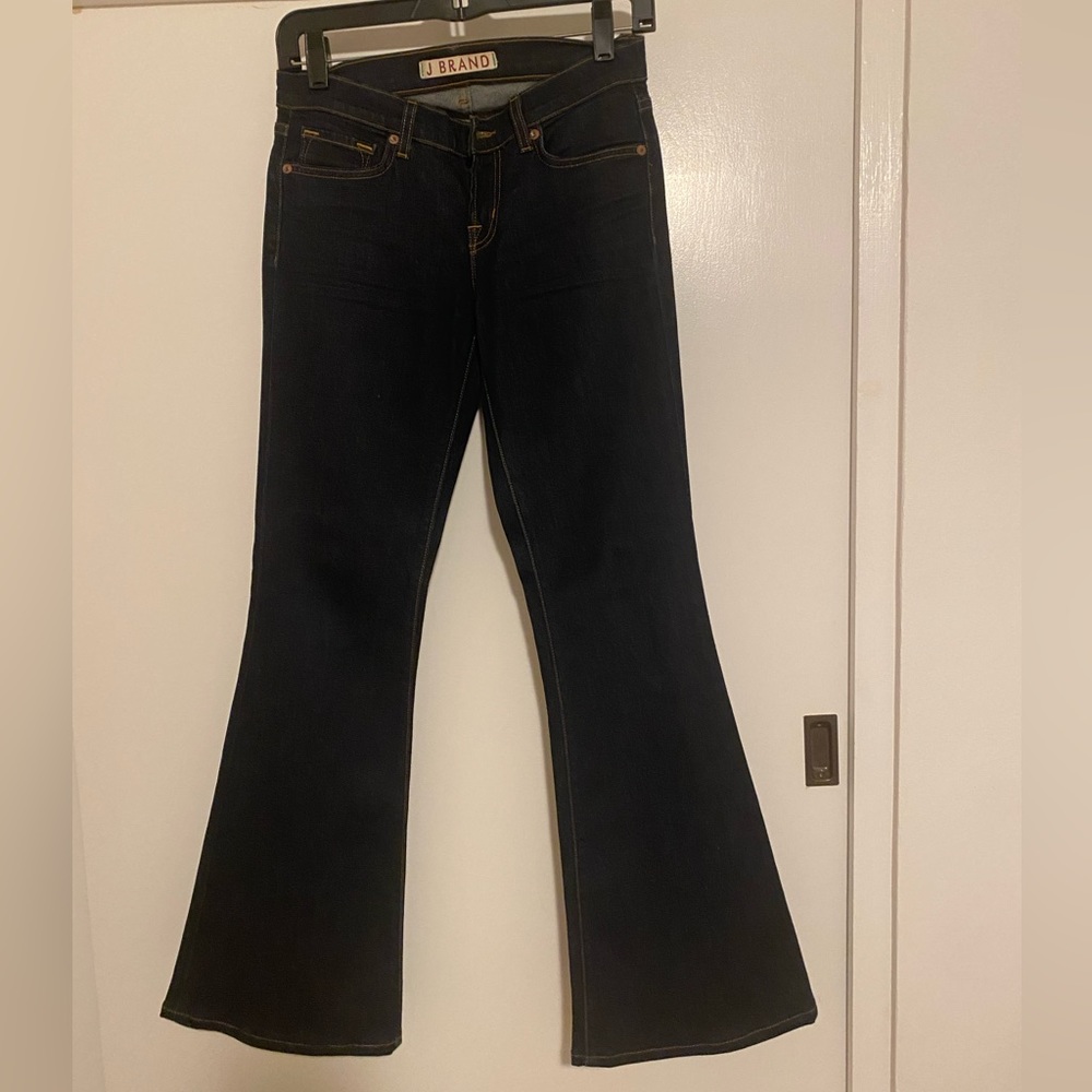 Super skinny low rise flare with faux front pockets dark wash size 26